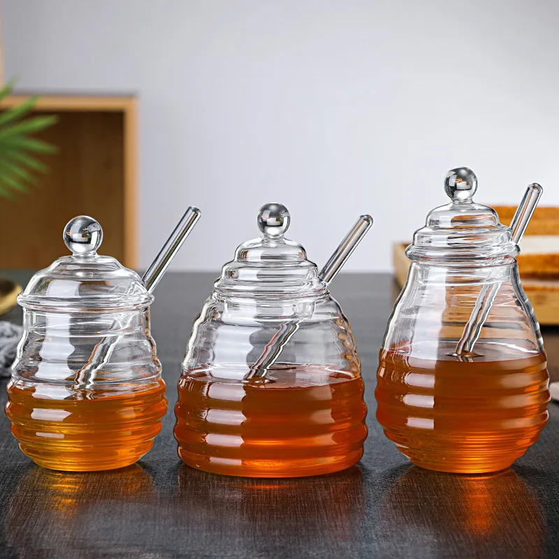 Wholesale household high borosilicate glass honey jar with lid glass stirring stick Honey bottle Creative glass transparent jar