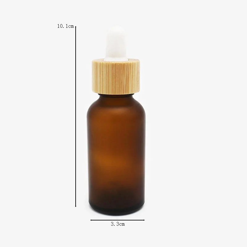 Liquid foundation serum custom 30ml frosted amber glass eye drop bottle with wooden looks cap dropper pipette on sale