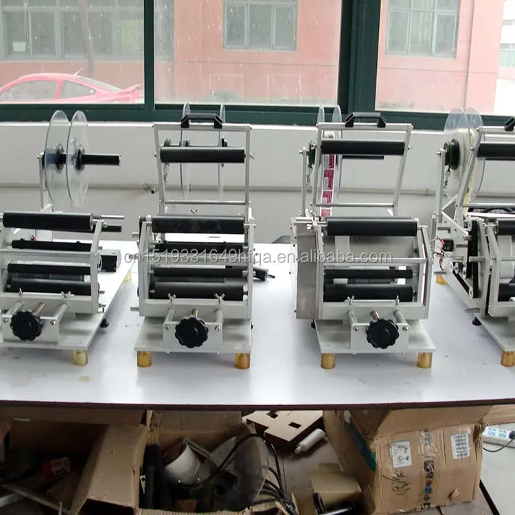 universal use Quality assurance manual labeling machine for oval labeling machine for plastic container multifunction new design 2022