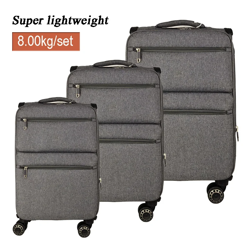 2021 Super Lightweight Luxury Waterproof Soft Luggage Bag Large Main Compartment 1680D Fabric Travel Rolling Suitcase