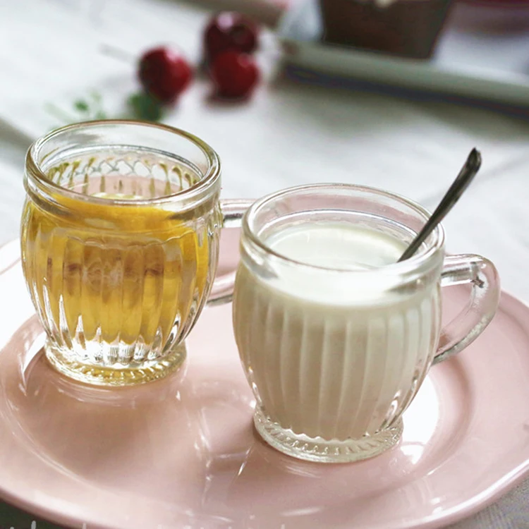 Xuzhou Stocks China Manufacture Wholesale Ribbed Pudding Bottle with Handle 130ml Coffee Tea Drinking Glass Cup