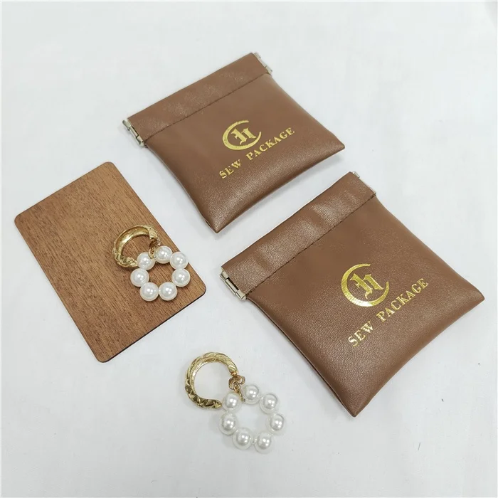 Fashion Squeezed Travel PU Packaging Bag Spring Opening Bags Luxury Leather Packaging Pouch For Cards Jewelry