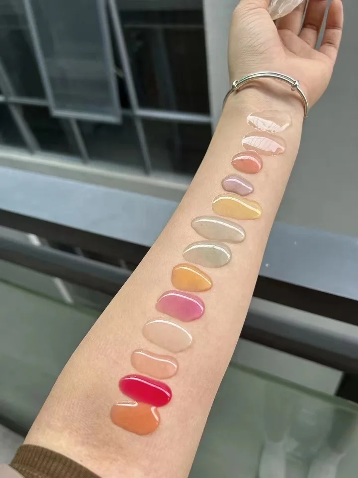 Private Label Vegan Beauty 10 Flavor Fruit Lip Oil Lip Plumper Lip Oil With Pink And White Lid Tube