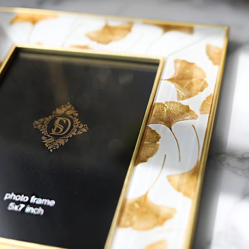 
Light luxury simple glass inkjet photo frame 6 inch 7 inch gold ginkgo leaf home decoration frame decoration 