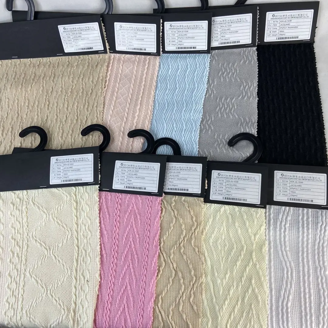European market  clothes material fabric 97%polyester 3% spandex stretch knit jacquard fabric for sweater
