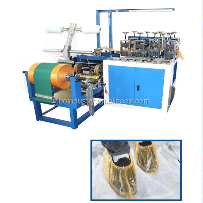 Машина для изготовления крышек для обуви из нетканого материала