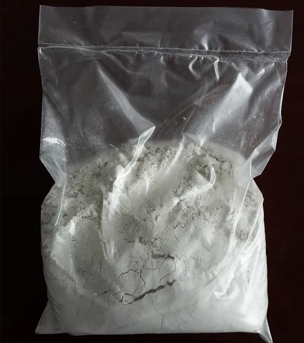 Clothed Calcium Oxide CaO-90 powder for rubber compound processing