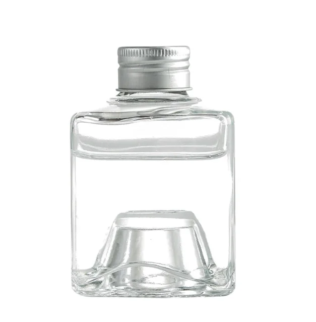 100ml 125ml unique luxurious round square stackable beverage juice vodka whisky tequila glass bottle with screw cap