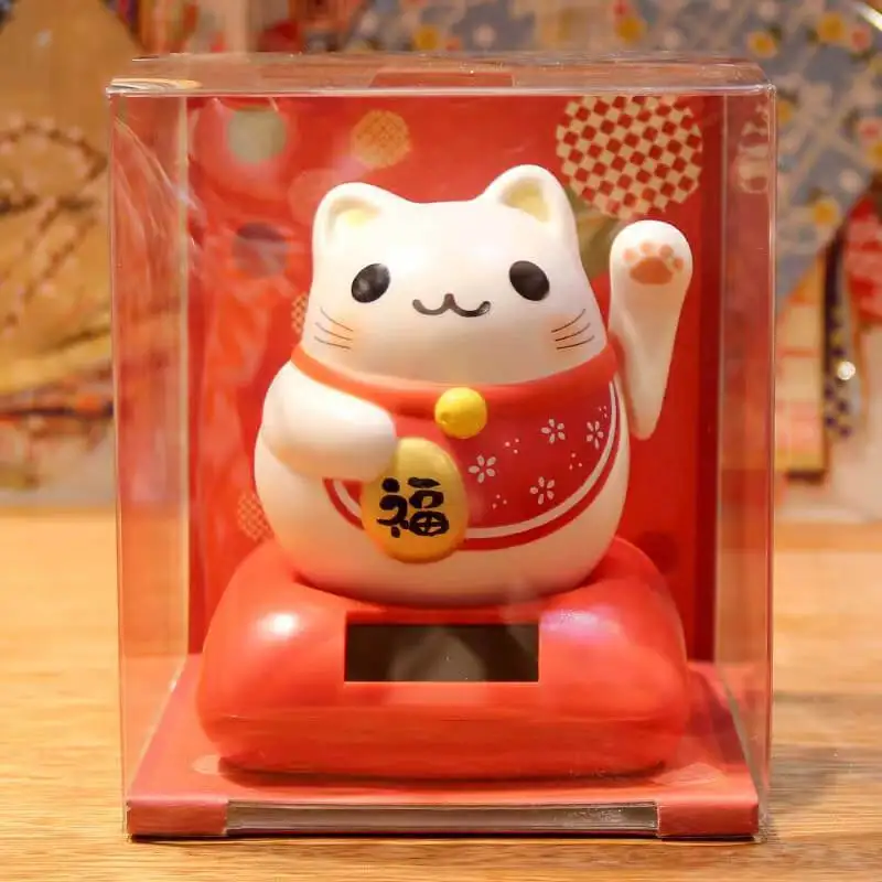 Solar energy lucky cat shaking head figure car transport high-end car decoration cute birthday gift