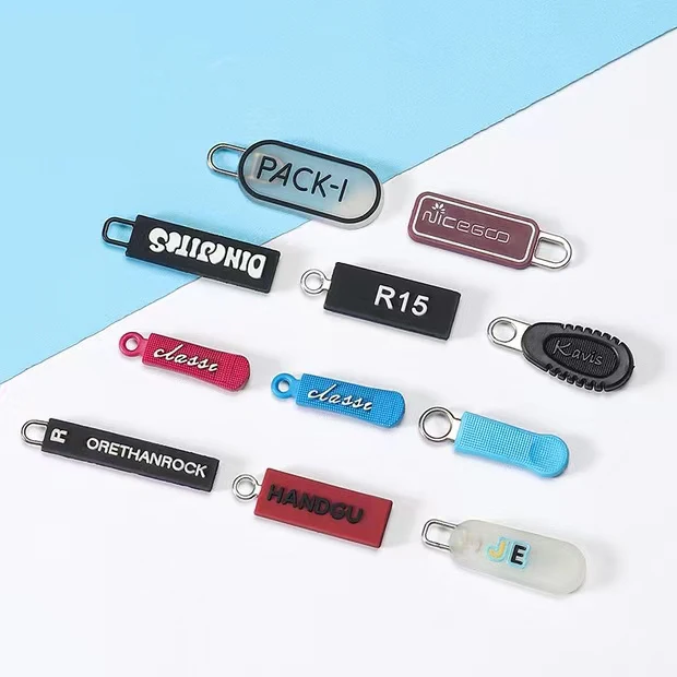 Manufacturers custom color cartoon soft offset printing word drop plastic soft glue pull sheet silicone zipper pull