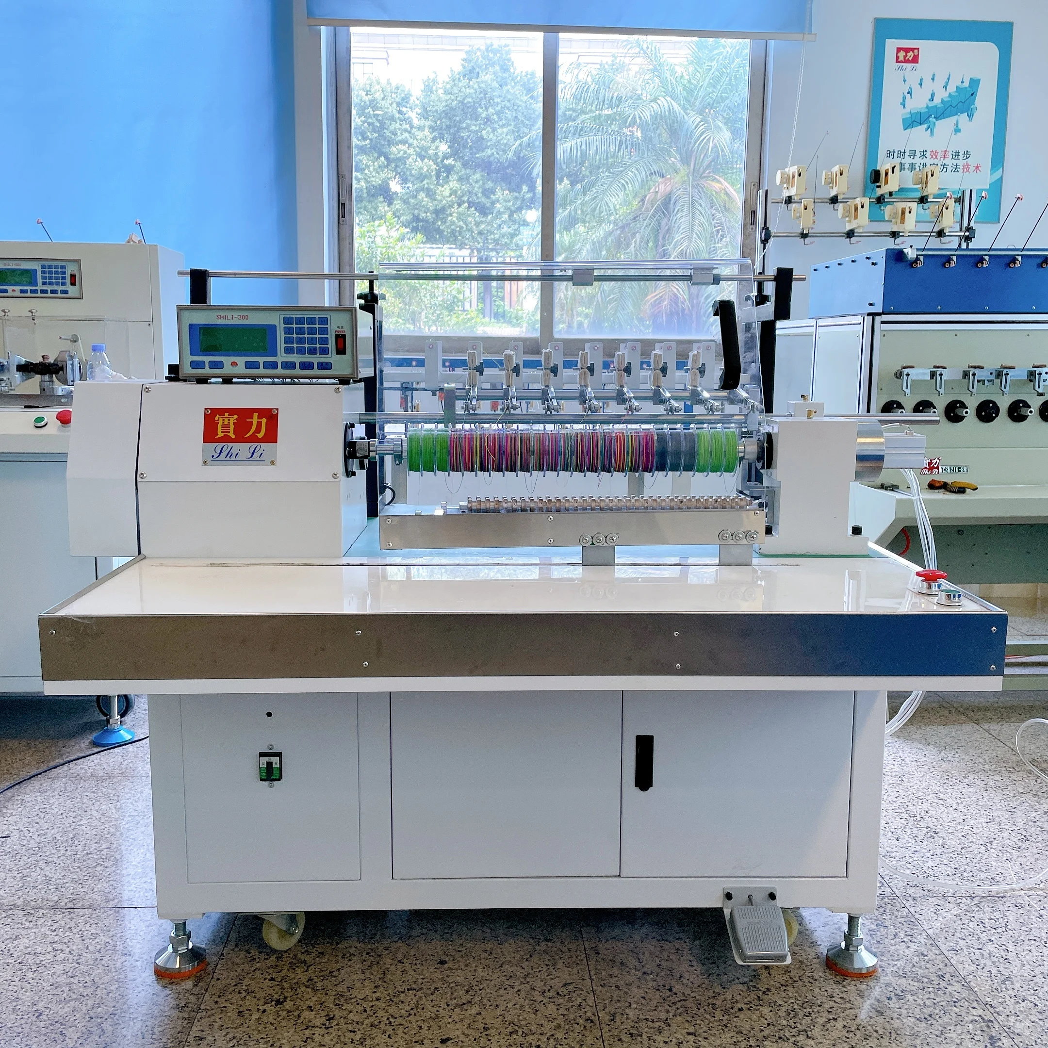 Eight spindle high production fishing line winding machine