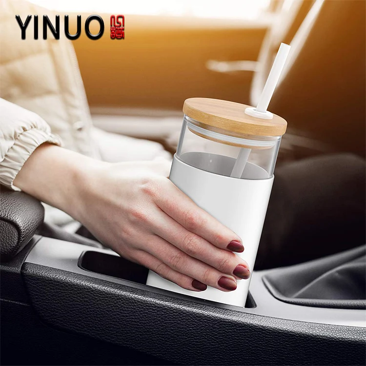 
Glass water tumbler bottle with bamboo lid and silicone sleeve 