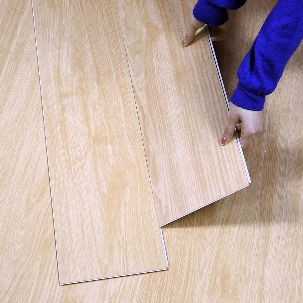 Guangzhou Factory Manufacturer Waterproof vinyl flooring Polyvinyl chloride tile 4 mm SPC PVC home office plastic floor