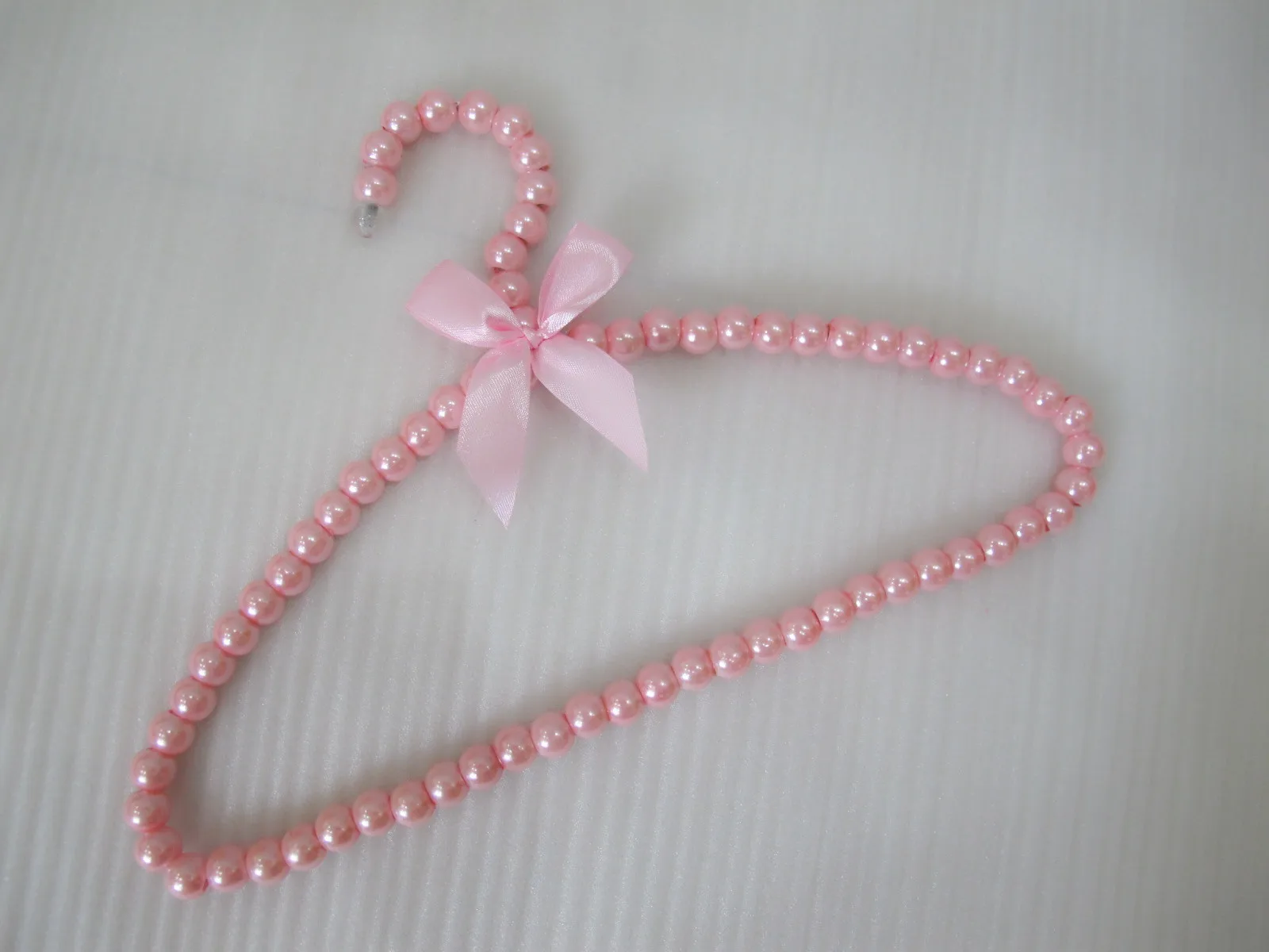 
1Pcs 20cm Children Pearl Clothing Hanger Dog Hangers for Clothes Baby kids Pearl Plastic Pet Hangers 