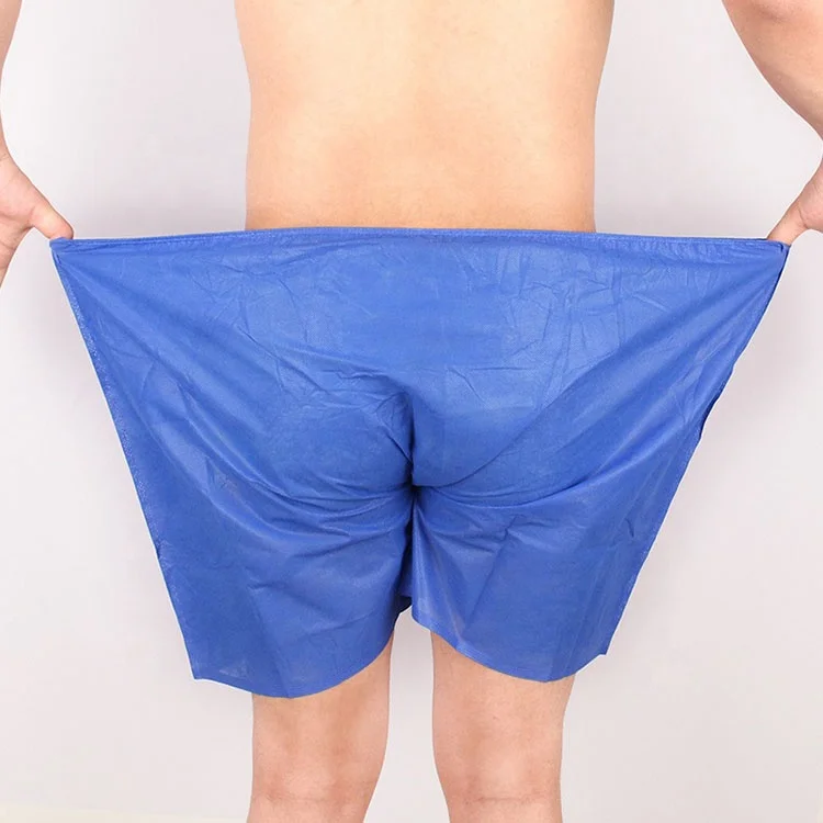 Promotional Men Custom PP Non Woven Fabric Disposable Single Use Travel Business Trip Disposable Underwear Pants boxer shorts