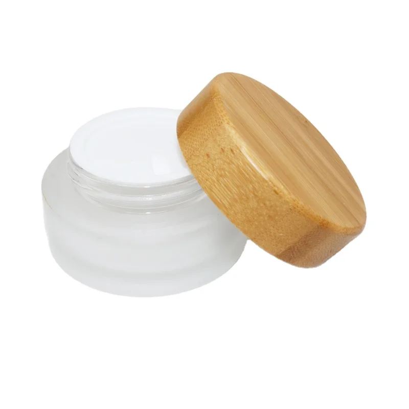 
Cosmetic Jar with Wood Cap 30ml 50ml 100ml Frosted Amber Glass Jar with Bamboo Lid for Cream 