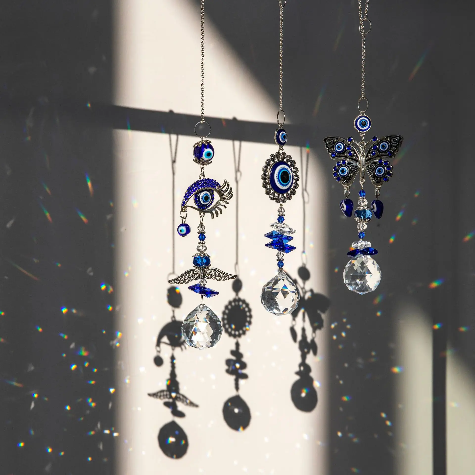 QIAO OEM/ODM Wholesale Crystal Evil Eye Light And Shadow Wind Chime  Hanging Window Gardening  Decor Sun Catcher