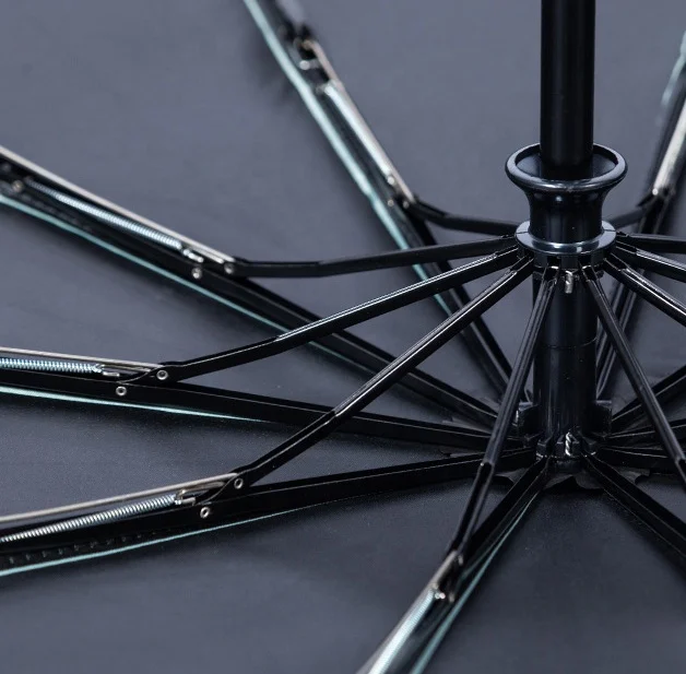 Manufacturers wholesale classic business automatic 10k vinyl three folding umbrellas for the rain