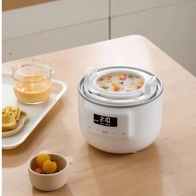 Multifunctional fully automatic rice cooker with reservation function for cooking rice, making porridge and boiling soup