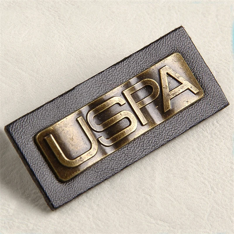 Custom jeans black leather patches with metal embossed logo labels for denim