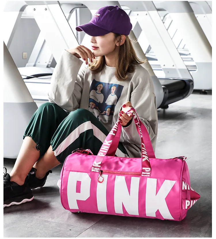 High quality outdoor sports travelling bag love pink tote duffle bag gym  waterproof customized logo pink duffle bag women