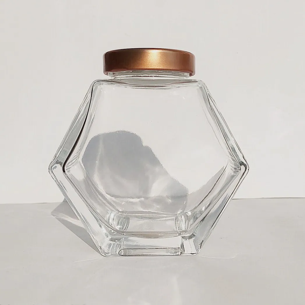 Wholesale Hexagon Glass Honey Container Honey Storage Bottle Glass Honey Jar With Metal Lid