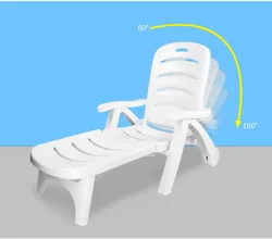 Outdoor beach hotel swimming pool plastic chaise lounge chair