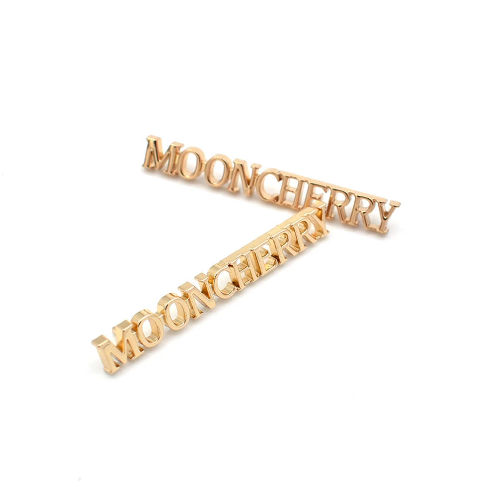 Изготовленные на заказ металлические этикетки для одежды с гравировкой логотипа бренда