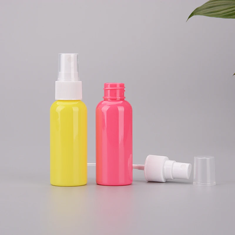 2oz 50ml Wholesale Colorful Empty Plastic Spray Bottle Cosmetic Skin Care Mini PET Bottle with Spray Pump Customized Labeling