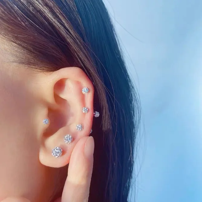 Manufacturers wholesale zircon laser ball ear piercing ear bone nails fashion simple all matching custom earrings