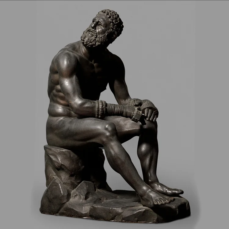 Bronze figure and goats sculpture statue on a square after rain next to cafe London in United Kingdom