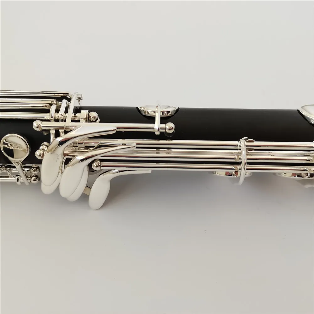 double register key Low Eb Bass Clarinet with Baige good case