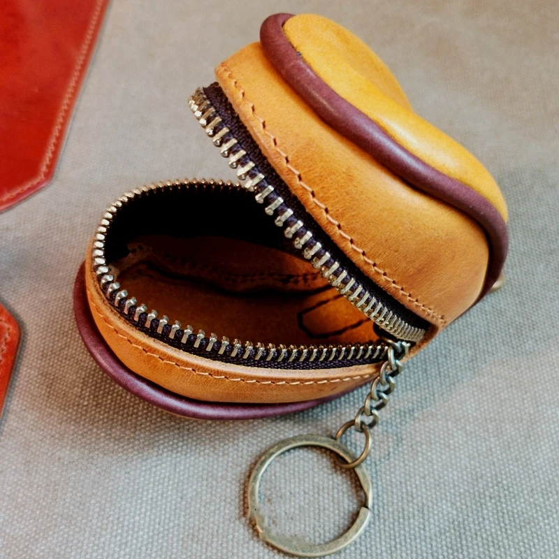 2024 Wholesale leather retro compact cowhide earphone storage bag men and women genuine oil waxed leather mini coin wallet purse