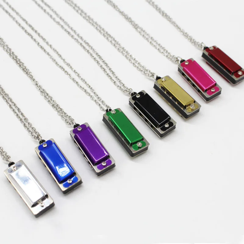 Wholesale custom logo hot selling stainless steel  4 hole 8 tone harmonica with opp  bag packing