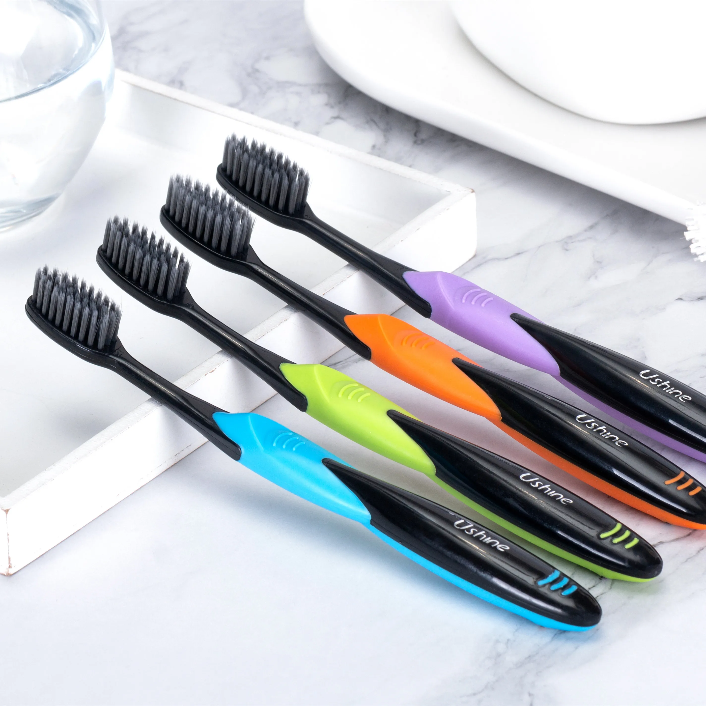 High quality ISO CE ROHS  approved charcoal bristles toothbrush  Wholesale OEM free sample Customized massage gum non bleed