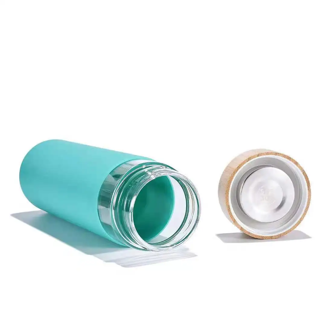 Amazon Hot Sale Bamboo Lid Borosilicate Glass Water Bottle With Silicone Sleeve Single Layer Glass Cup With Handle