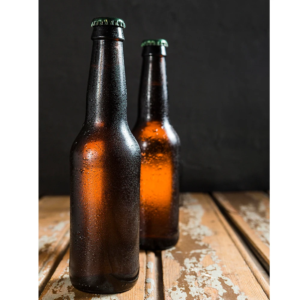 Factory low price high quality beer bottle glass bottle with lid