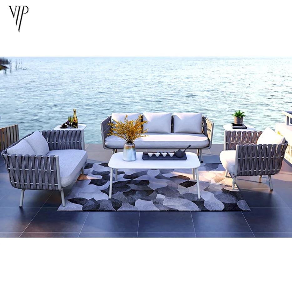 Modern design popular wicker chair 4 piece outdoor sofa set furniture patio rattan with glasstop table garden rope furniture