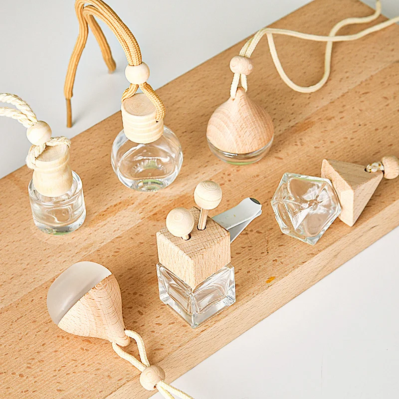 Popular INS Cylindrical Shaped 5ml 10ml Hanging Car Air Freshener Car Perfume Glass Bottle with Wood Cap and Ring
