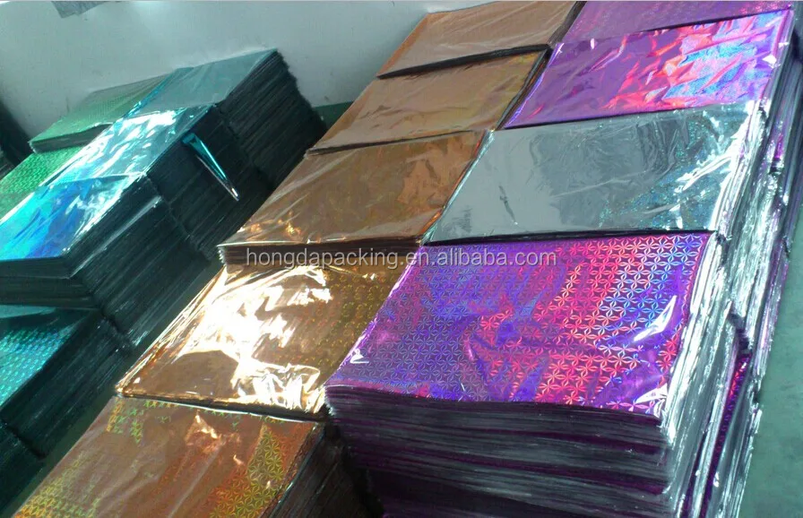 50 70 Gift wrapping paper design popular packing sheet holo gift film packing paper gift paper cheap