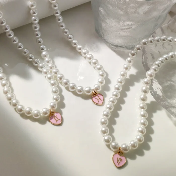 2022 New Design Fashion Enamel Pink Heart Pendant 12 Horoscope Pearl Beaded Zodiac Sign Choker Necklace For Women