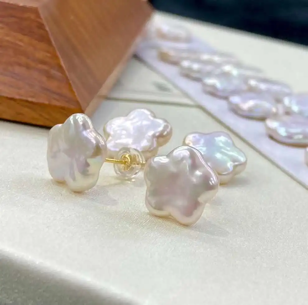 Hot selling S925 sterling silver earrings, new natural freshwater Baroque shaped plum blossom pearl stud earrings