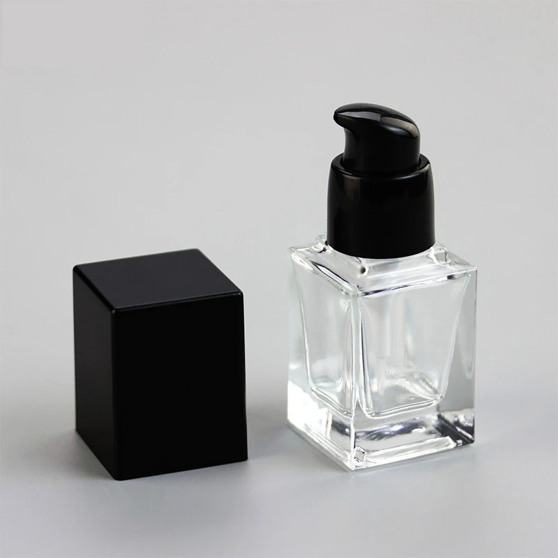 Beautiful empty 30ml cosmetic glass lotion bottles with pump dispenser