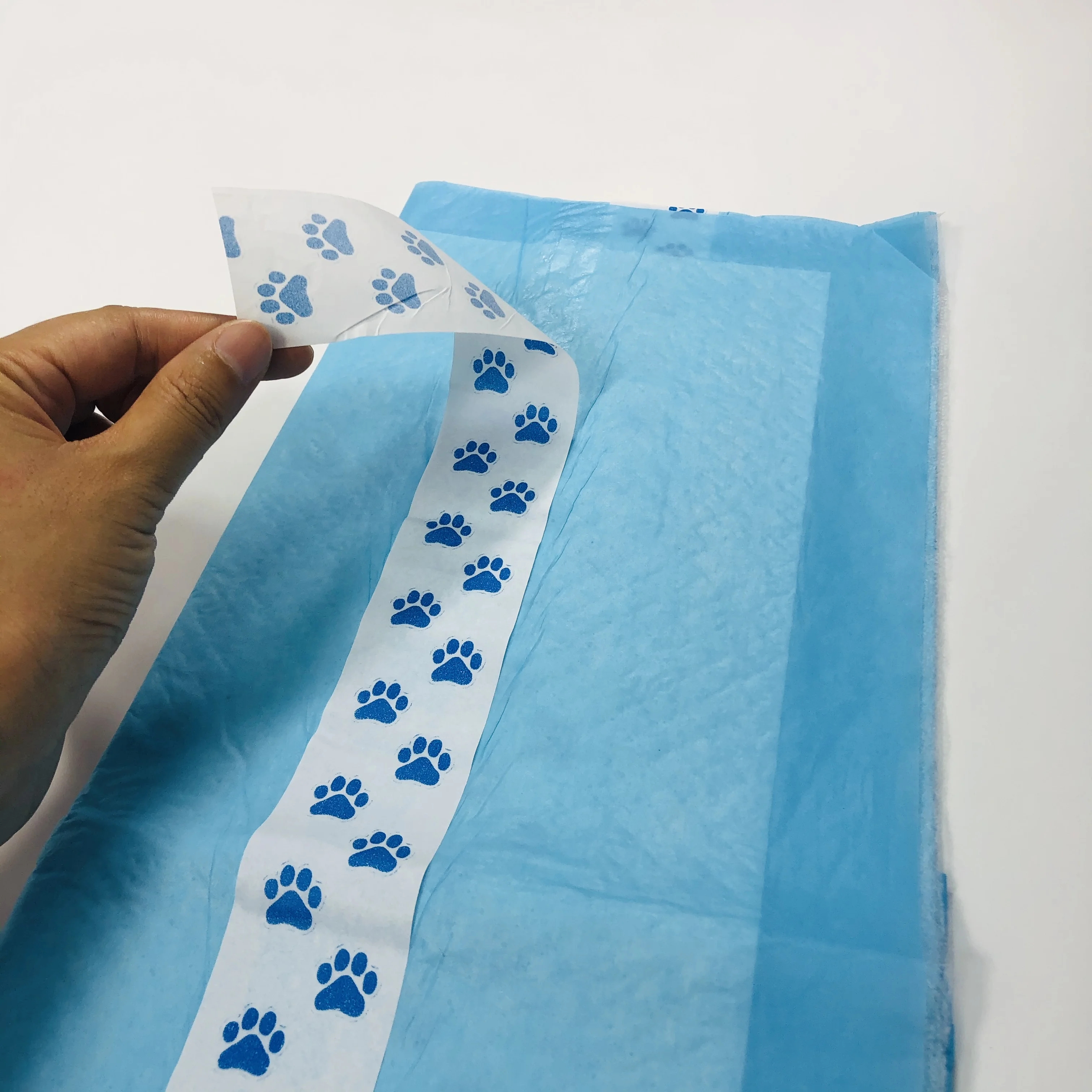 Wholesale Unscented Pet Pad Disposable Training Puppy Pads with Adhesive Tape