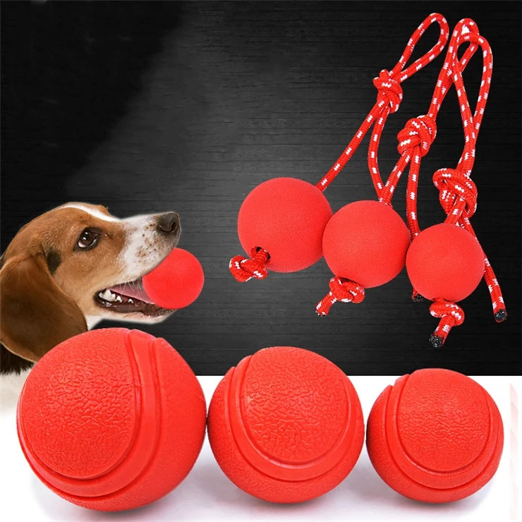 Hot Sale Pet Molar Toy with Rope Rubber Dog Toy Ball Dog Training bite Resistant Ball Solid Bouncy Ball
