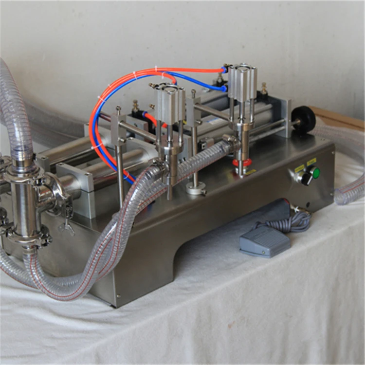 YTK double-head beverage water piston filler pneumatic liquid filling machine