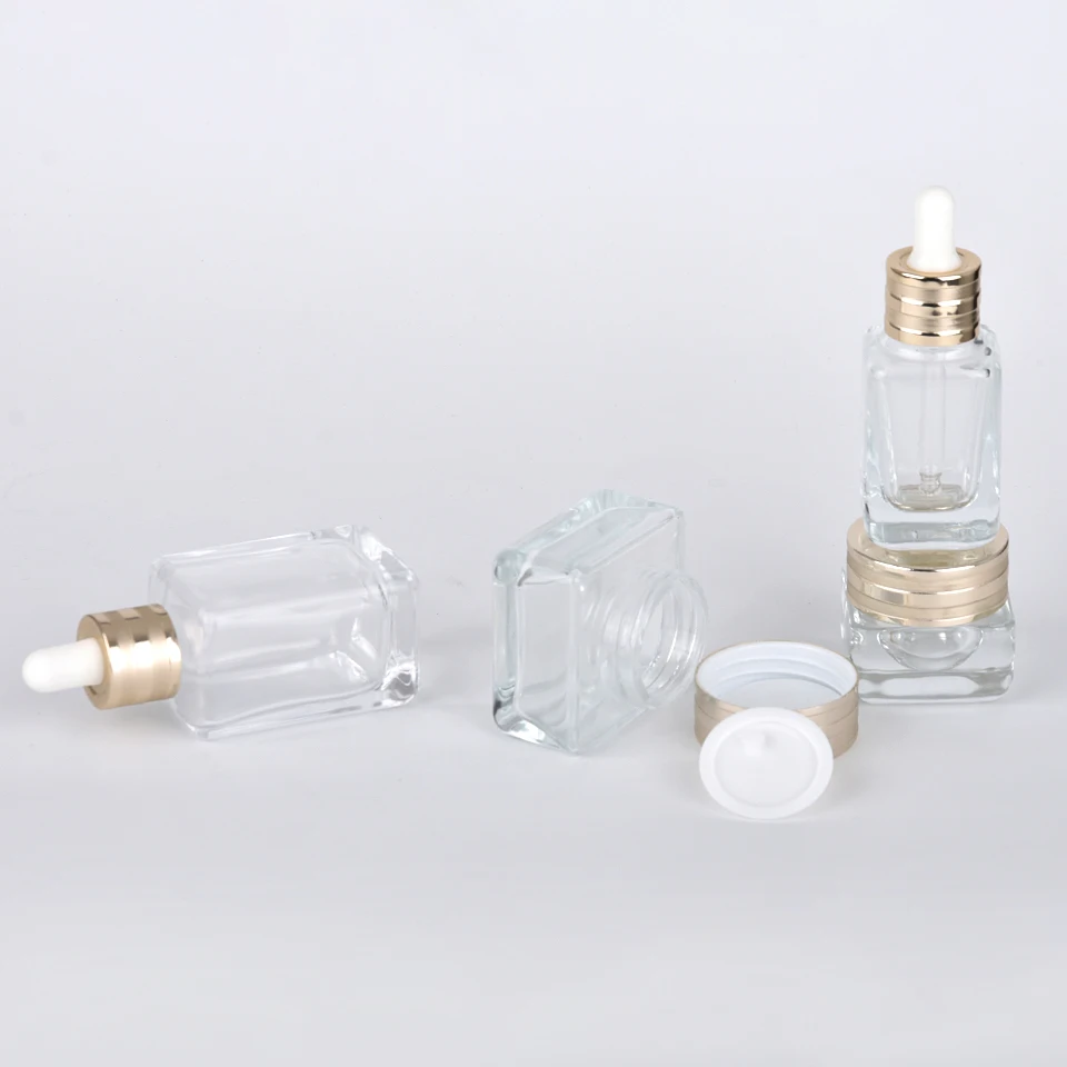 Luxury Cosmetic Container 30ml 50ml Makeup Set Square Shape Clear Glass Serum Bottles With Gold Dropper Cap
