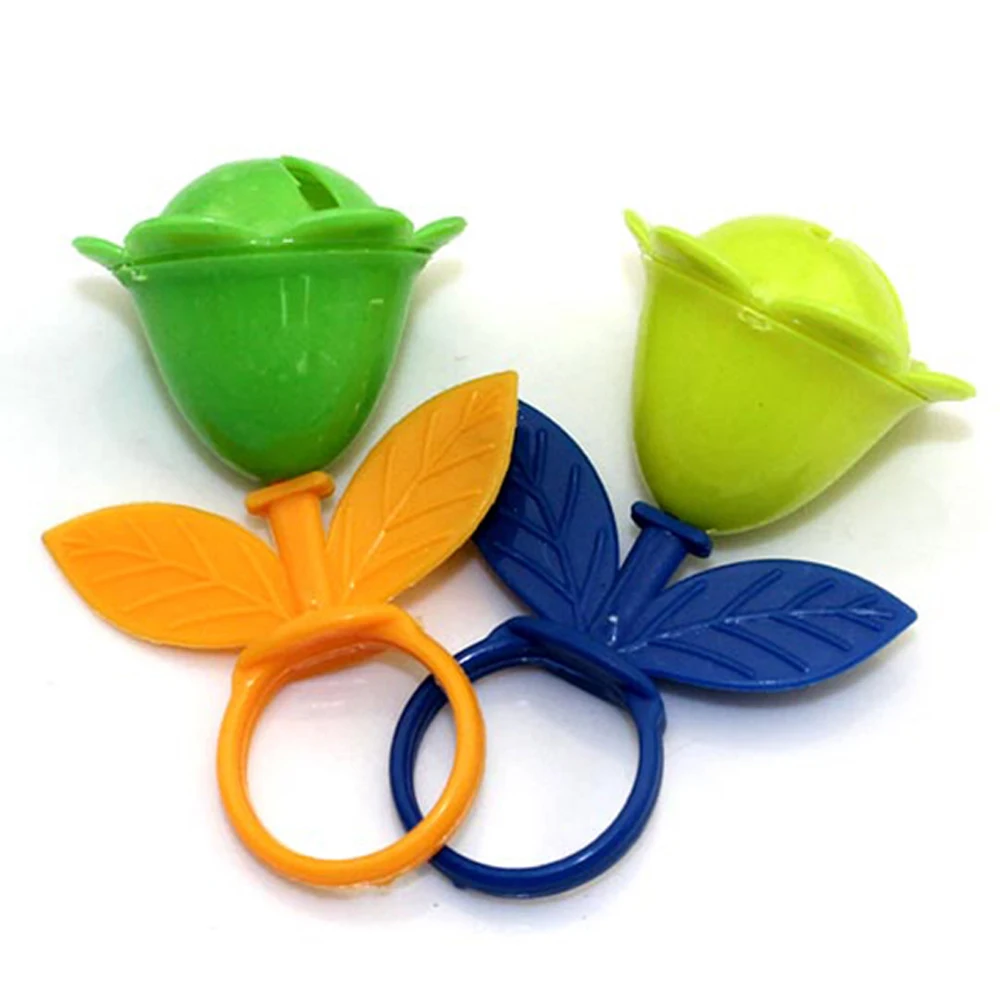 Promotional Cheapest Funny Plastic Finger Toy Rattle Flower Rings For Girl Play game