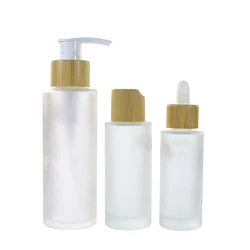 Wholesale Cosmetic Lotion Packaging 30ml 50ml 100ml 120ml 150ml Frosted Glass Spray Bottle With Bamboo Lid