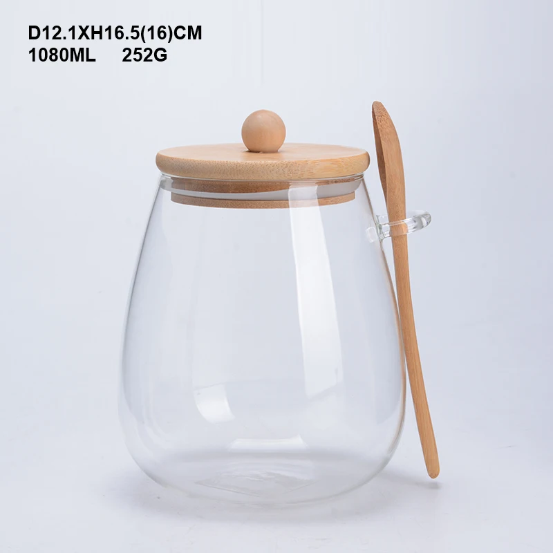 Glass spice jar container with bamboo spoon and lid